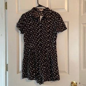 La hearts black romper with white flowers